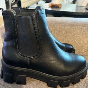 New without tags. Never worn faux leather boots.